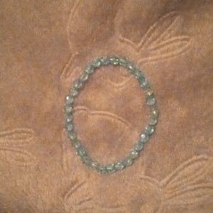 Minimalist handmade shiny and iridescent fun casual light blue bracelet